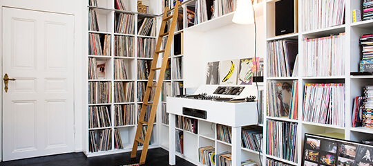 A home office with a record collection.
