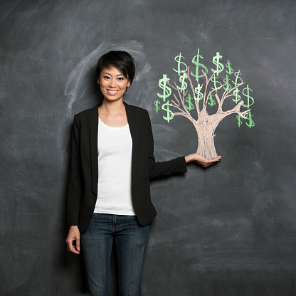 woman with chalk money tree drawing.