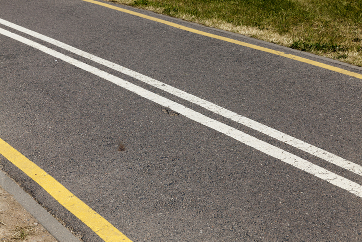 broken white lines cycle lane