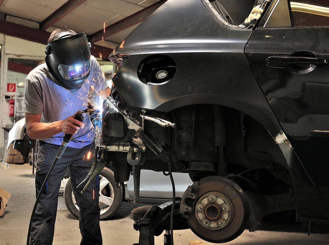 Mechanic working on a car